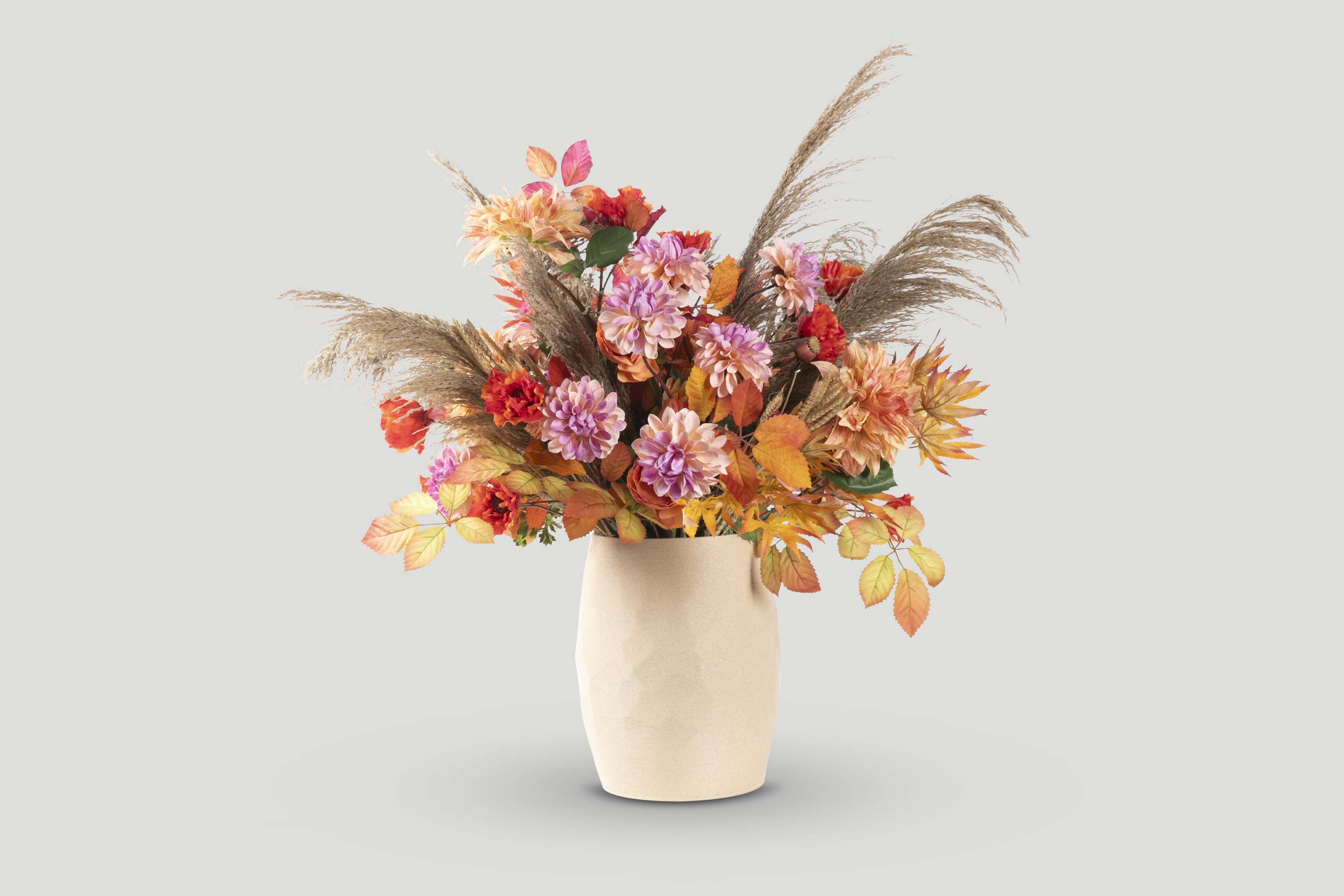 Autumn Arrangement in Beige Vase with Colorful Blooms