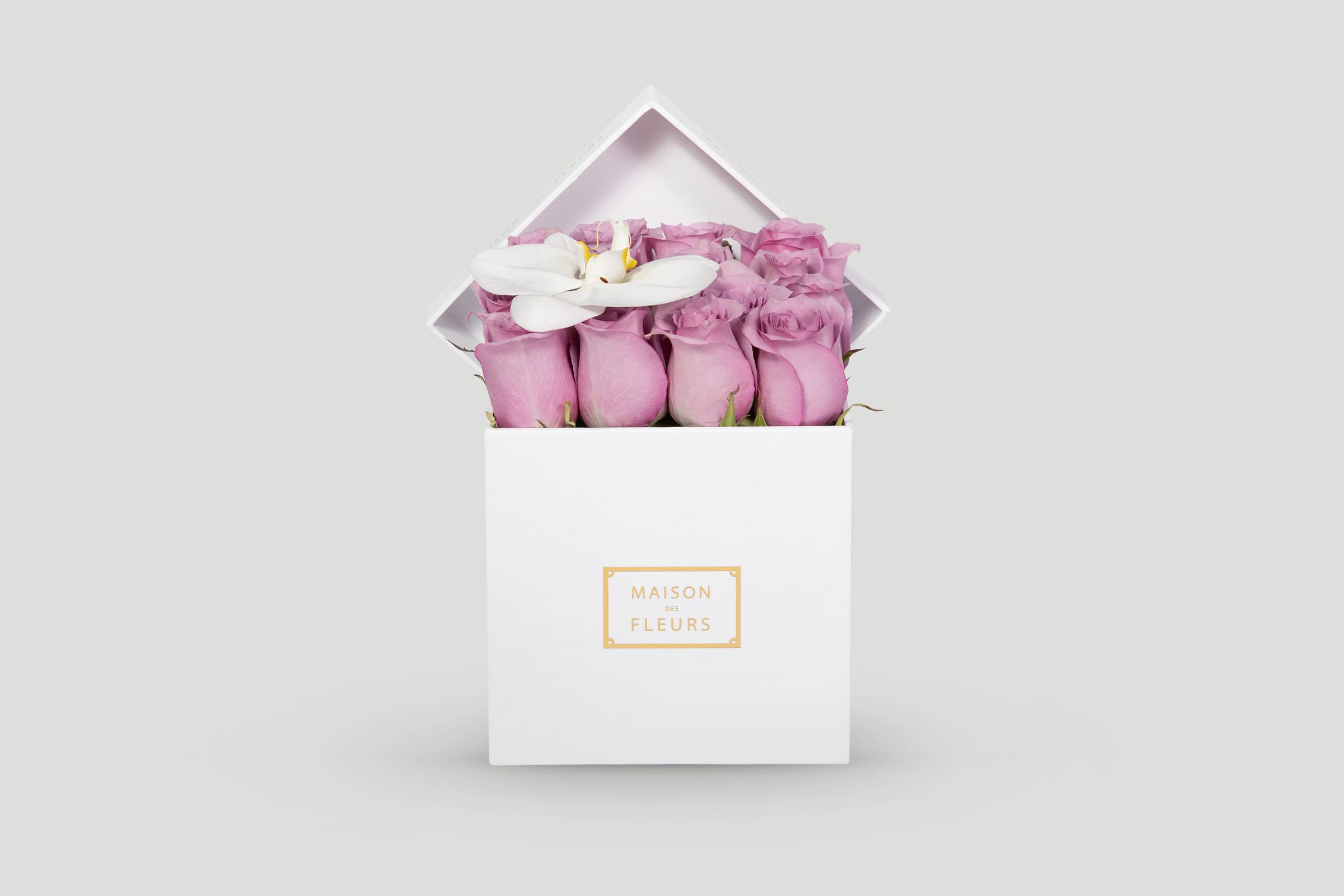 Fresh Roses and Orchids in a Square Box