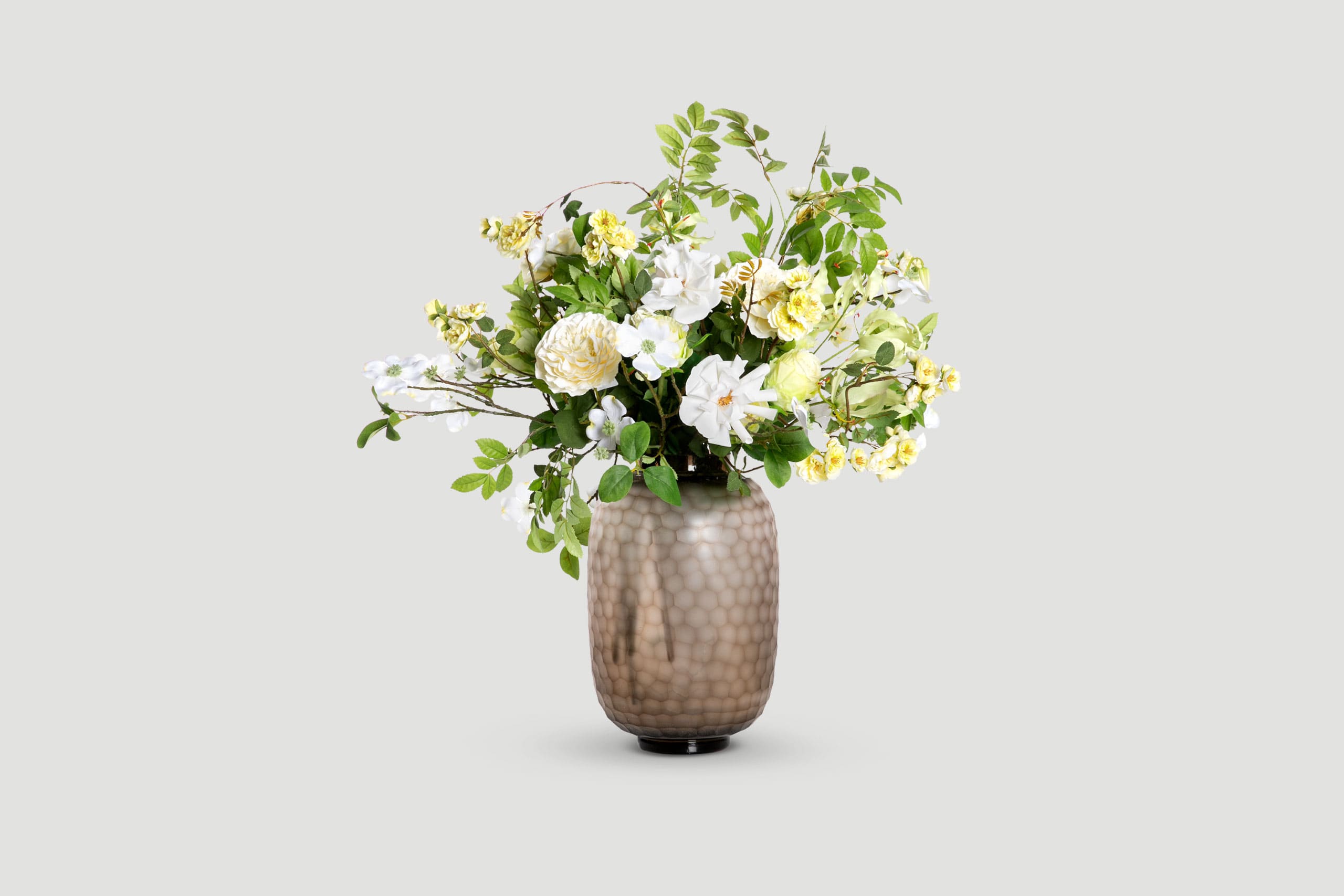 Textured Vase With White And Yellow Roses And Green Foliage